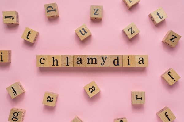 Creative,Concept,Chlamydia,Word,On,Wooden,Block.,Flat,Lay.